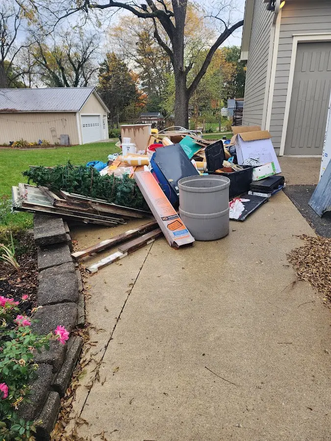 Dumpster being loaded with debris for 30 Yard Dumpster Rental in Boulder City